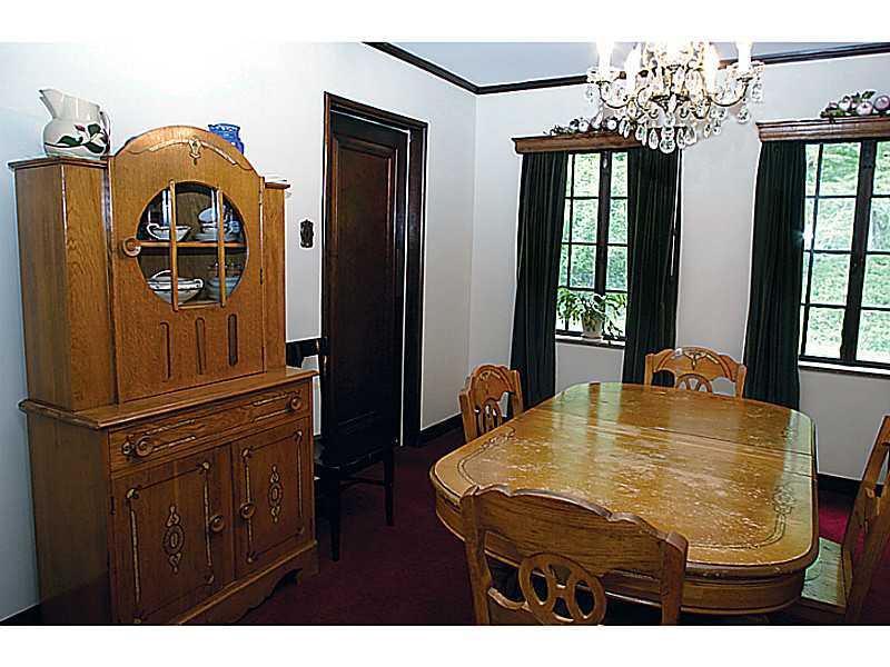 1397 Abers Creek Road Monroeville, PA 15146 - Photo 14 of 25 Dining Room. The Dining Room overlooks the wonderful backyard and is between the Kitchen on the left and the Living Room on the right.
