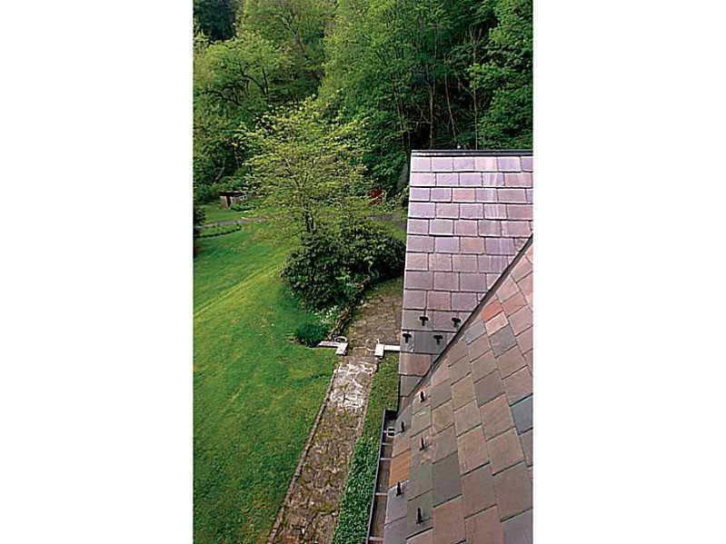 1397 Abers Creek Road Monroeville, PA 15146 - Photo 18 of 25 View. View from the landing of at that gorgeous slate roof. The driveway and waterfall are in the background.