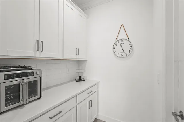 a bathroom with a sink double vanity and a mirror