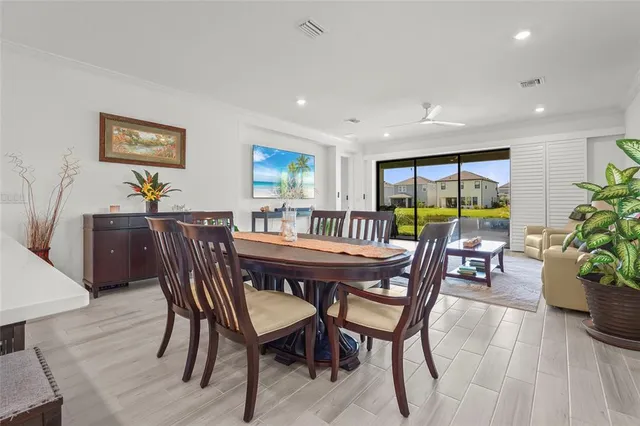 a bathroom with a sink a bathtub a mirror and a shower
