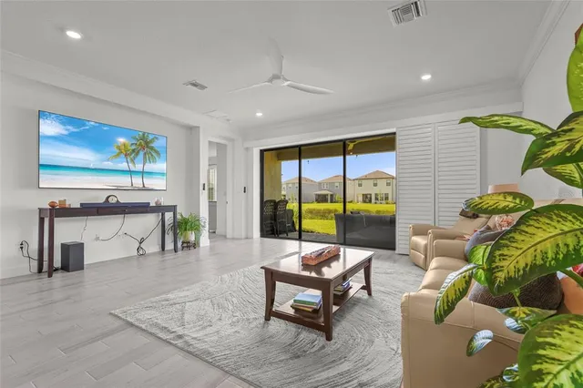 a living room with furniture and a window