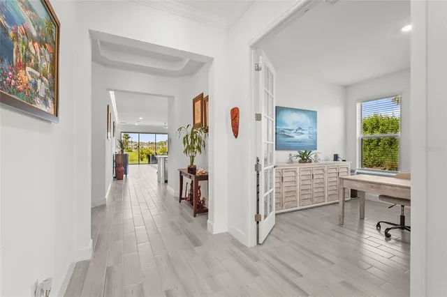 an aerial view of residential house with outdoor space and swimming pool