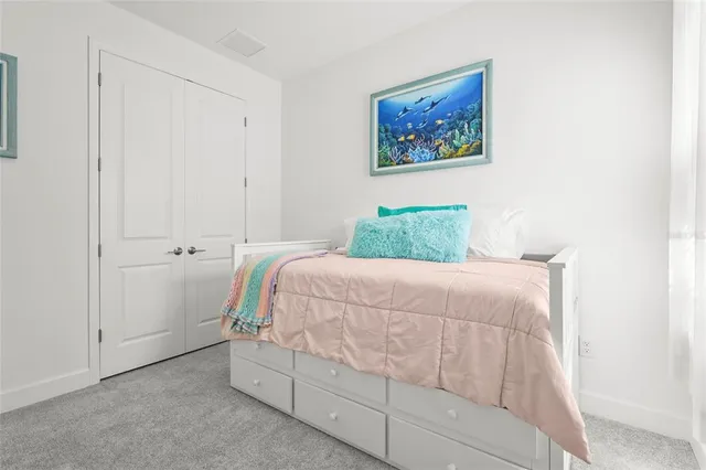 a view of a swimming pool with a yard