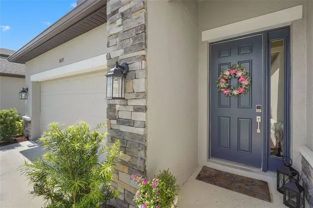 a kitchen with stainless steel appliances a sink stove and cabinets