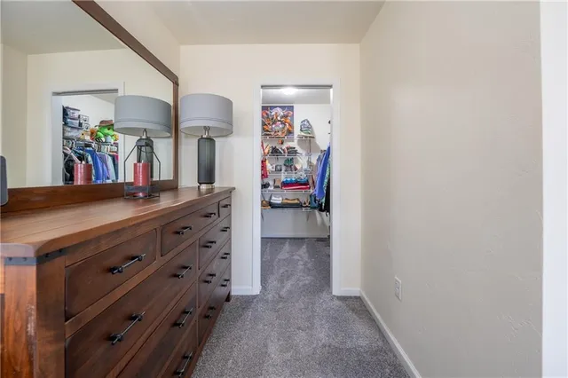 a view of a hallway with closet