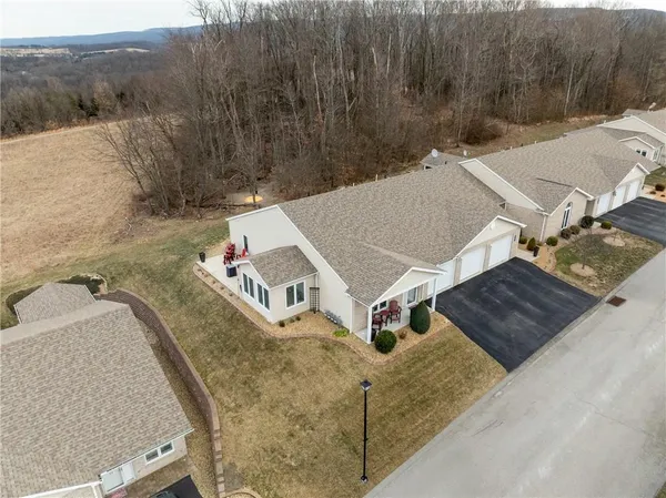 an aerial view of residential house with outdoor space