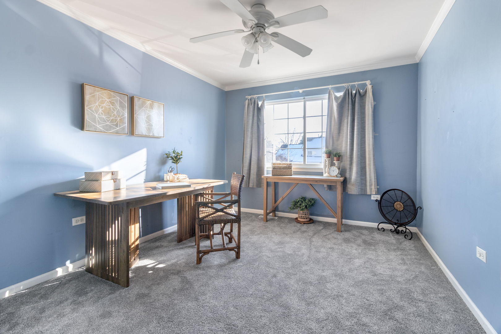 533 Mallard Lane, Unit D Sugar Grove, IL 60554 - Photo 11 of 12 a view of a workspace with furniture and a window