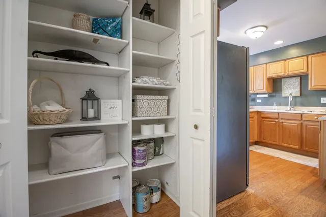 a view of a livingroom with furniture and a window