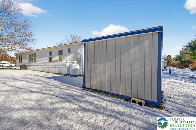 a view of a back yard of the house