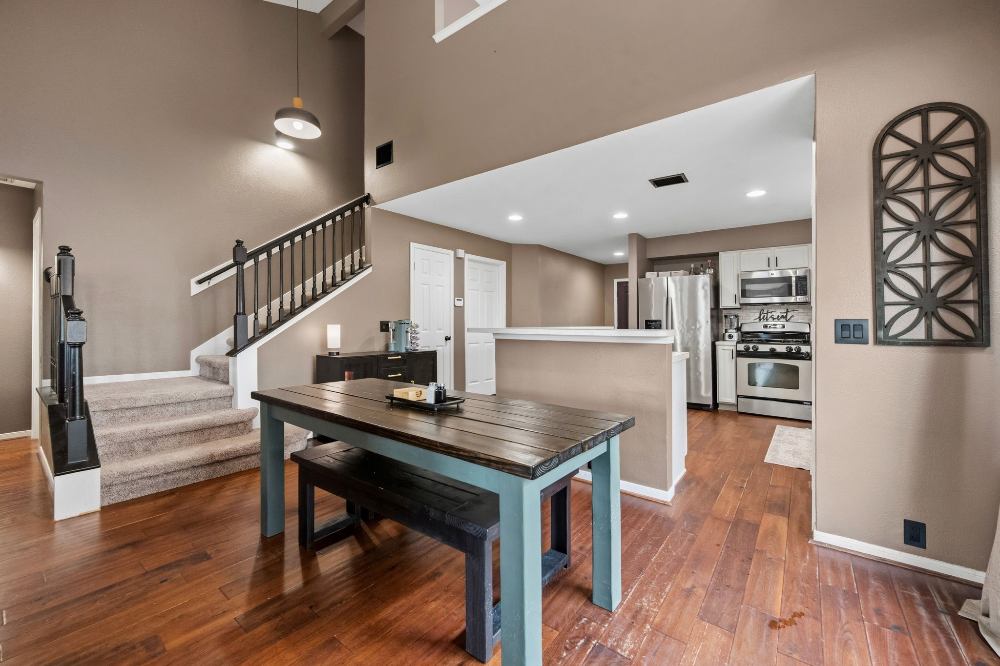 11903 Ezekiel Road Tomball, TX 77375 - Photo 12 of 30 a room with furniture and wooden floor