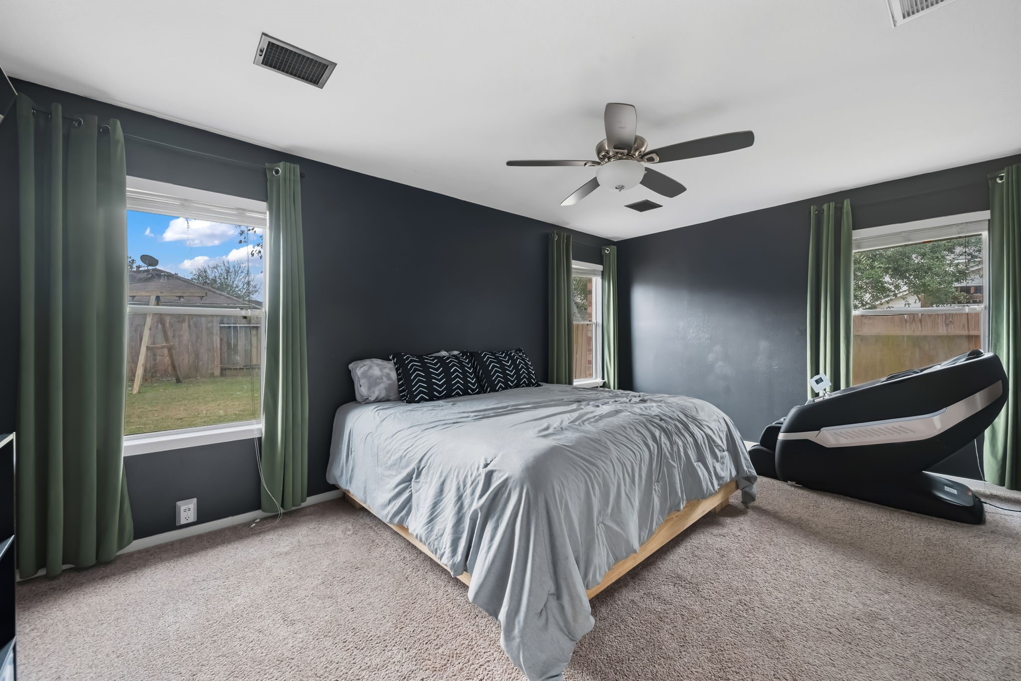 11903 Ezekiel Road Tomball, TX 77375 - Photo 17 of 30 a spacious bedroom with a bed and large window