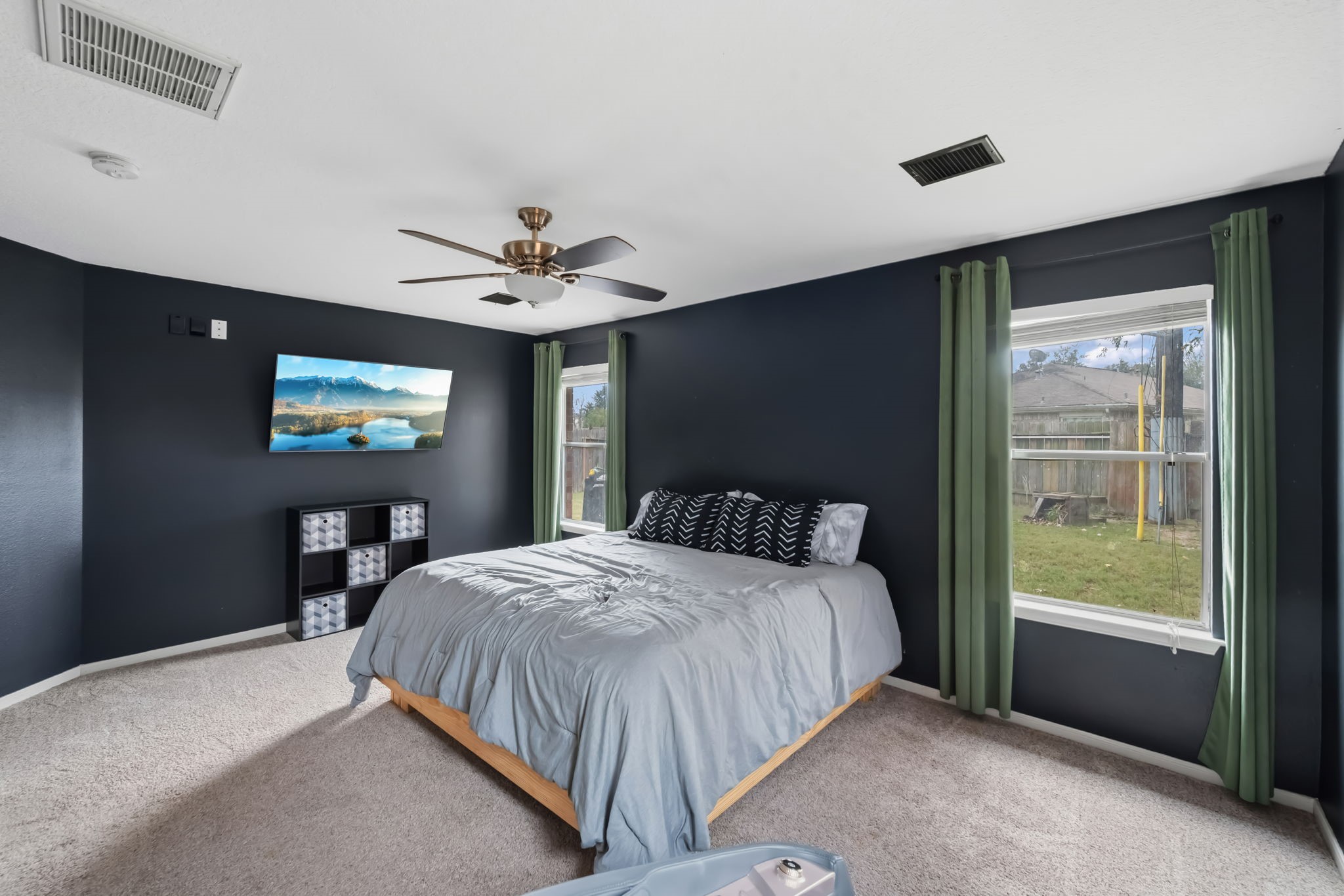 11903 Ezekiel Road Tomball, TX 77375 - Photo 18 of 30 a bedroom with a bed and a table