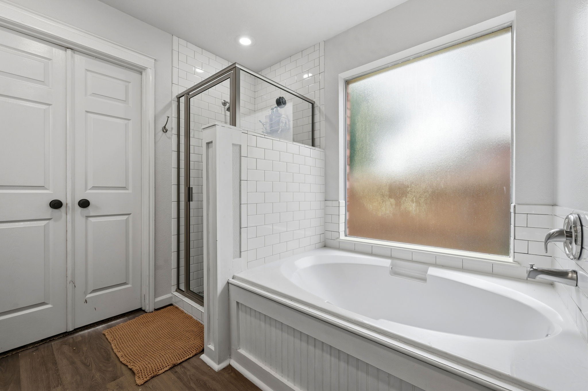 11903 Ezekiel Road Tomball, TX 77375 - Photo 20 of 30 a bathroom with a bathtub and a shower
