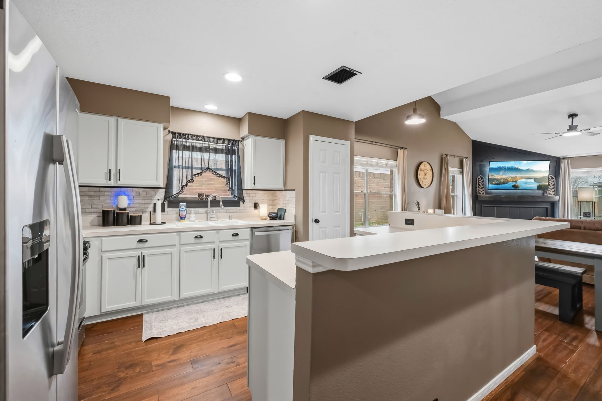 11903 Ezekiel Road Tomball, TX 77375 - Photo 6 of 30 a kitchen with sink stove and refrigerator