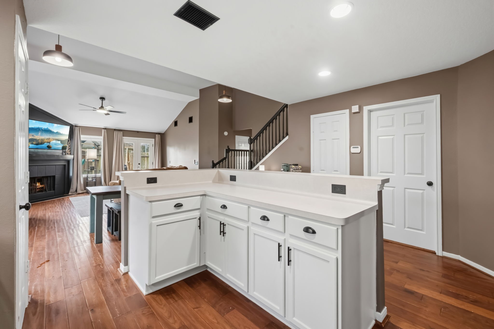 11903 Ezekiel Road Tomball, TX 77375 - Photo 9 of 30 a kitchen with a sink window and a refrigerator