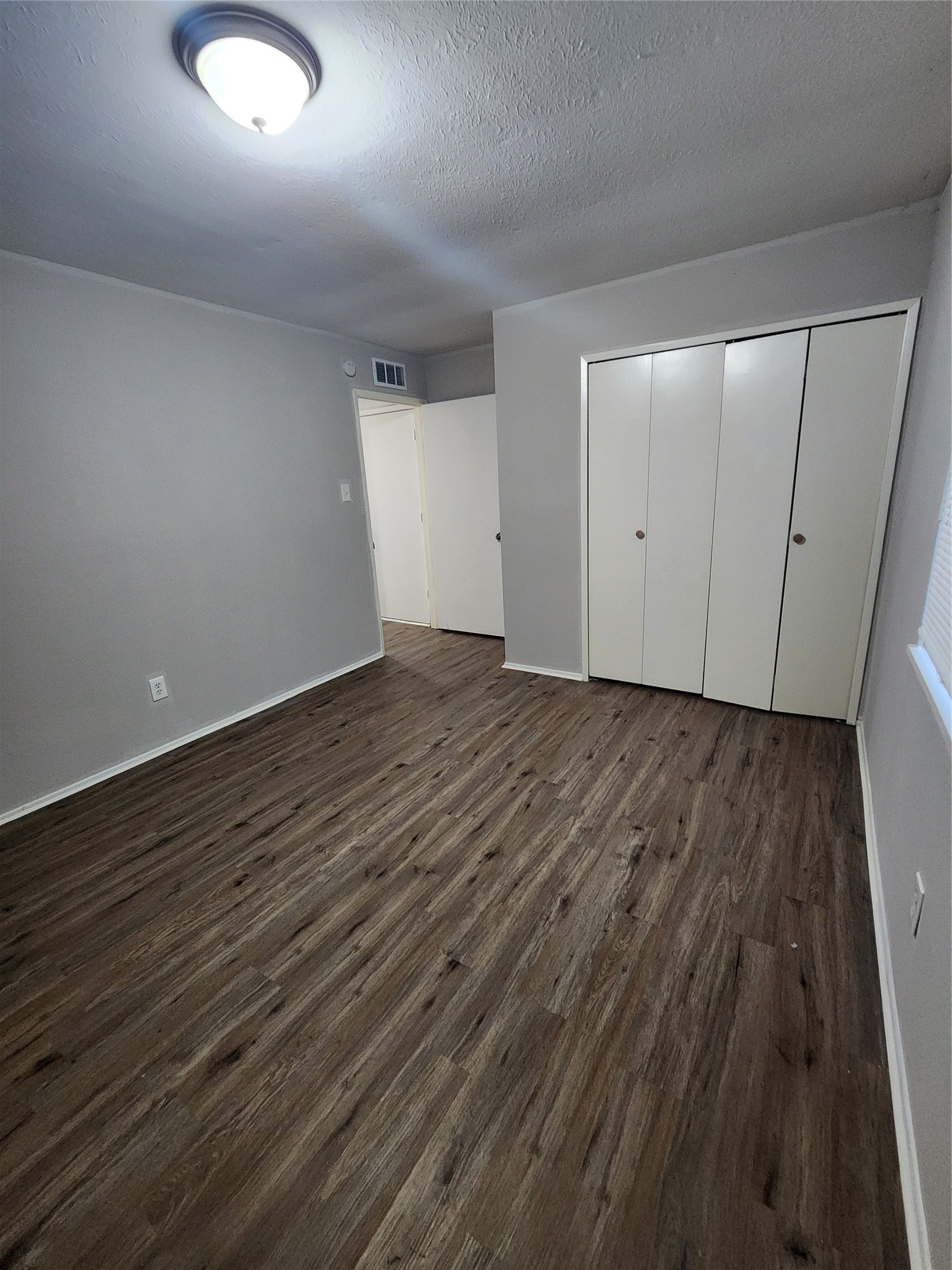 3822 Broken Elm Drive Spring, TX 77388 - Photo 21 of 25 a view of an empty room with wooden floor