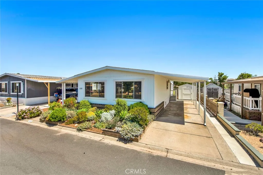 a view of a house with a garden