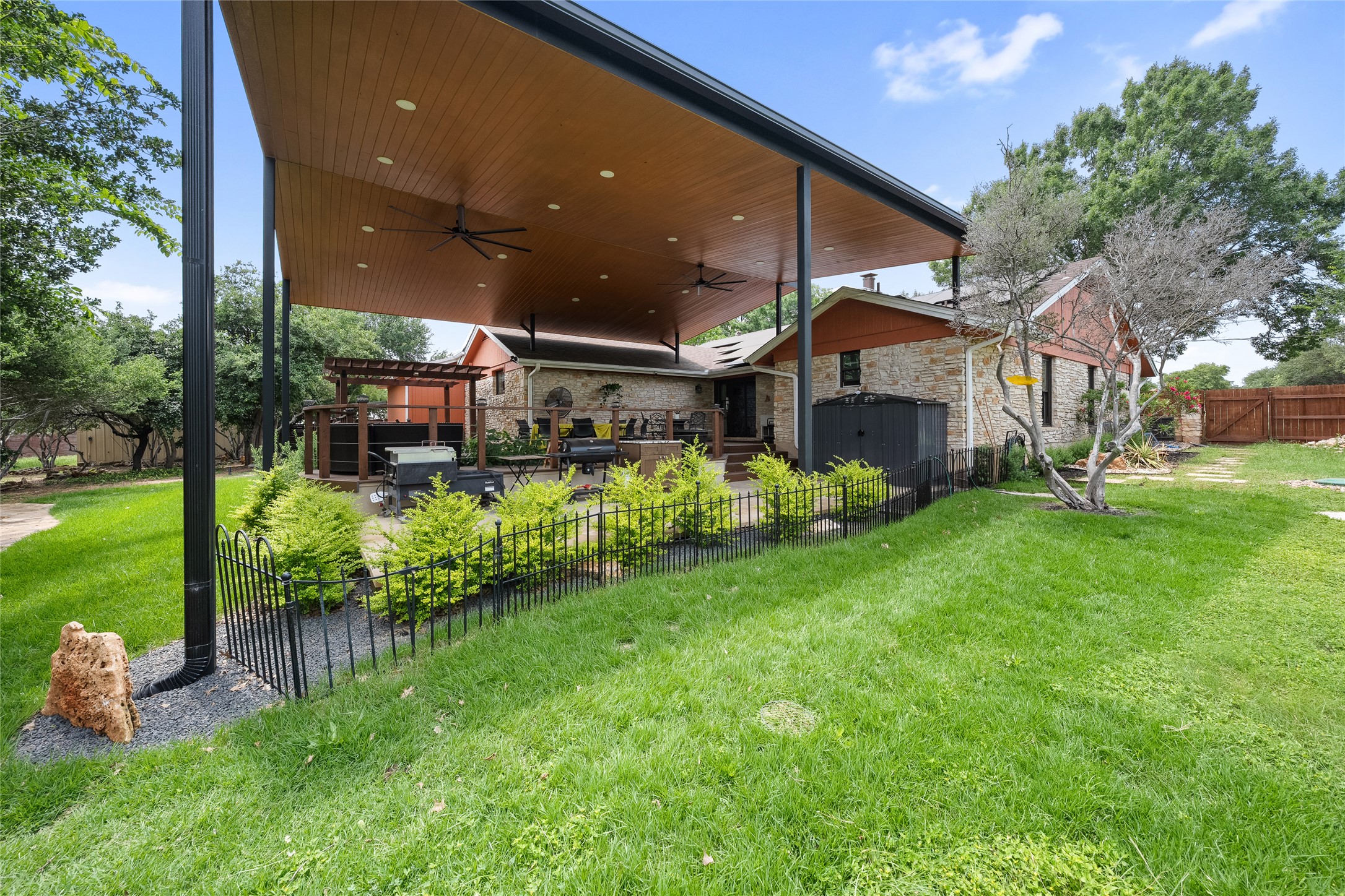 301 Oak Ridge Road Georgetown, TX 78628 - Photo 18 of 34 Expansive covered patio featuring a wood-finish ceiling, recessed lighting, and ceiling fans