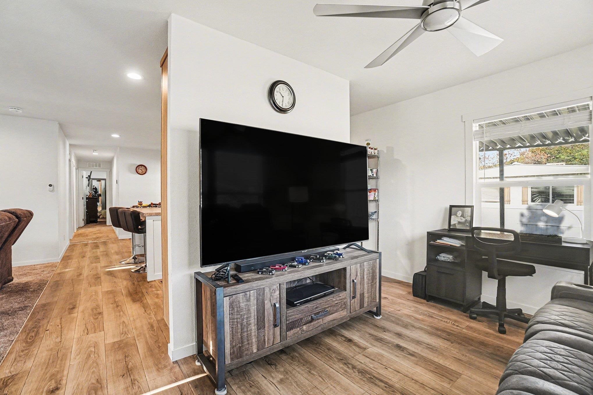 16711 Marsh Creek Road, Unit 150 Clayton, CA 94517 - Photo 13 of 19 a living room with furniture and a flat screen tv
