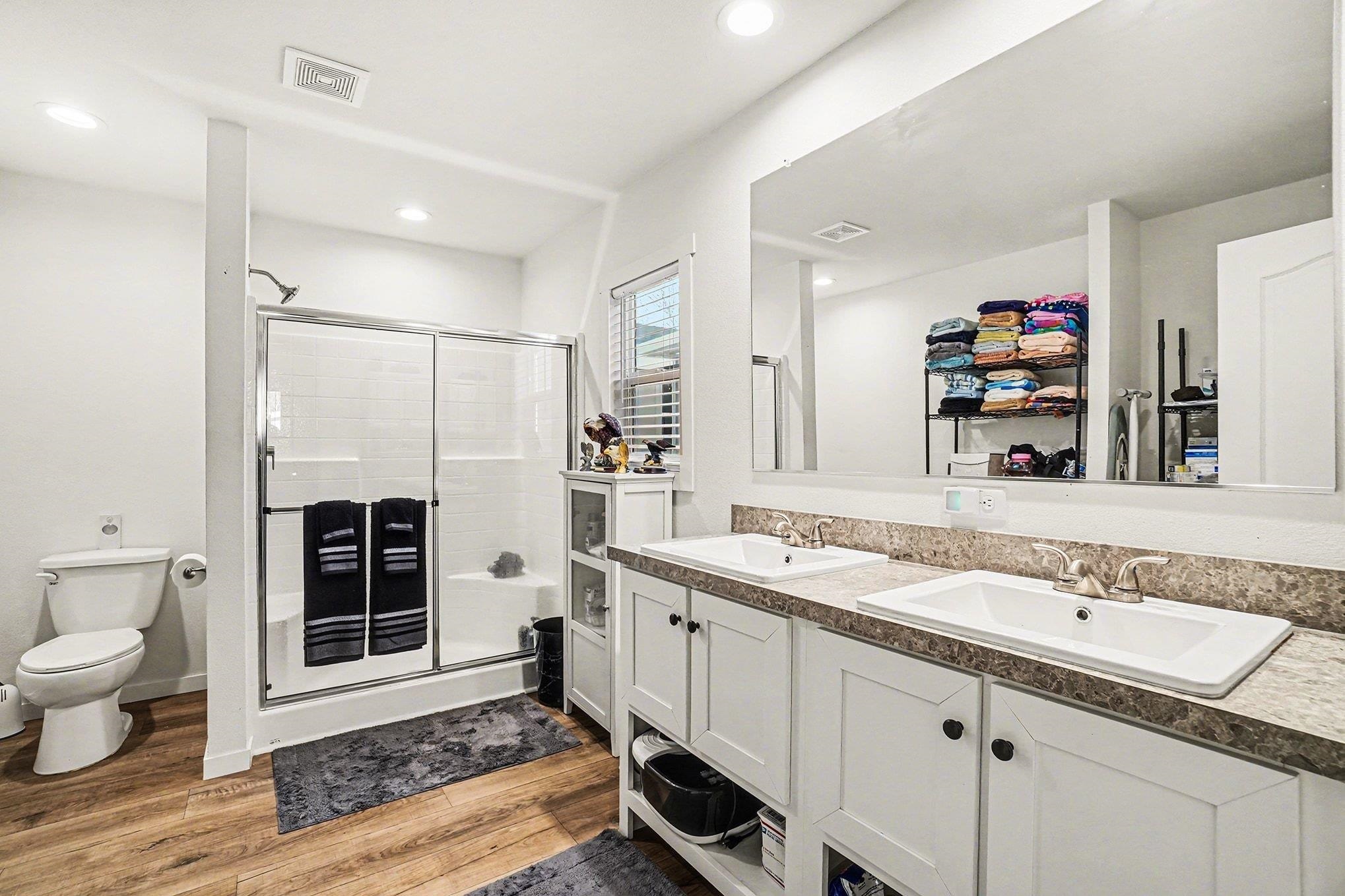 16711 Marsh Creek Road, Unit 150 Clayton, CA 94517 - Photo 16 of 19 a spacious bathroom with a sink double vanity and a mirror