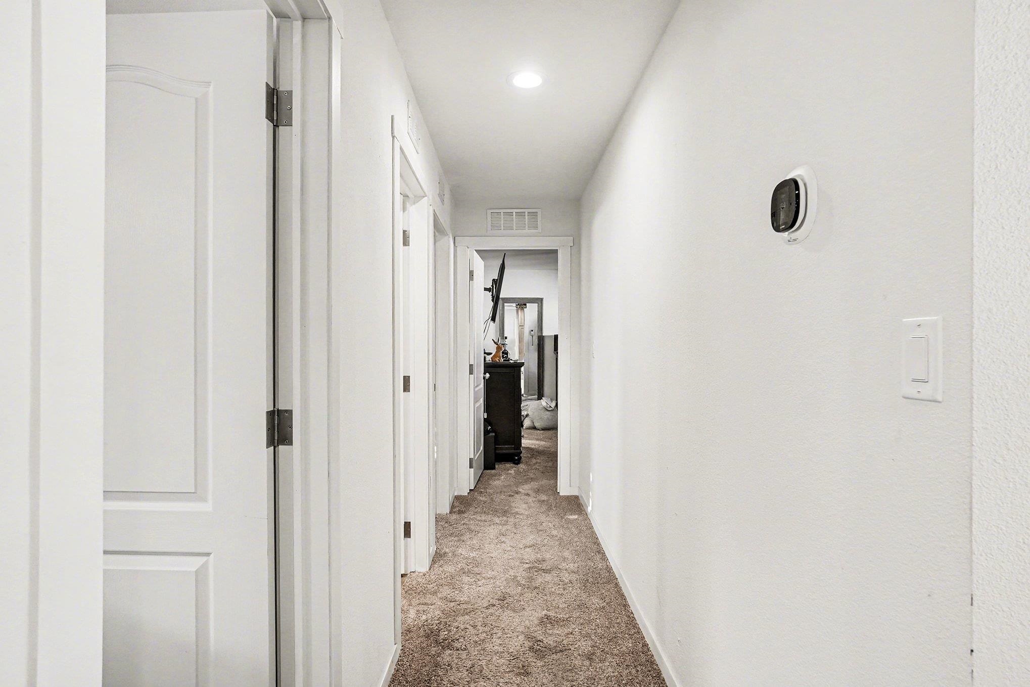 16711 Marsh Creek Road, Unit 150 Clayton, CA 94517 - Photo 7 of 19 a view of a hallway with wooden floor