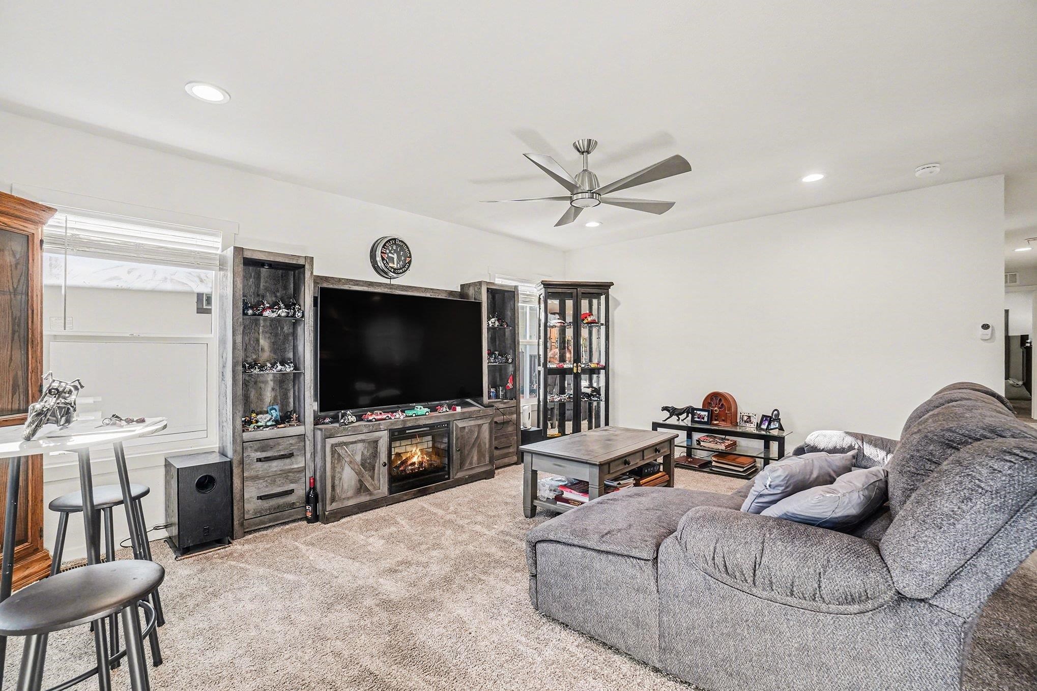 16711 Marsh Creek Road, Unit 150 Clayton, CA 94517 - Photo 9 of 19 a living room with furniture and a flat screen tv
