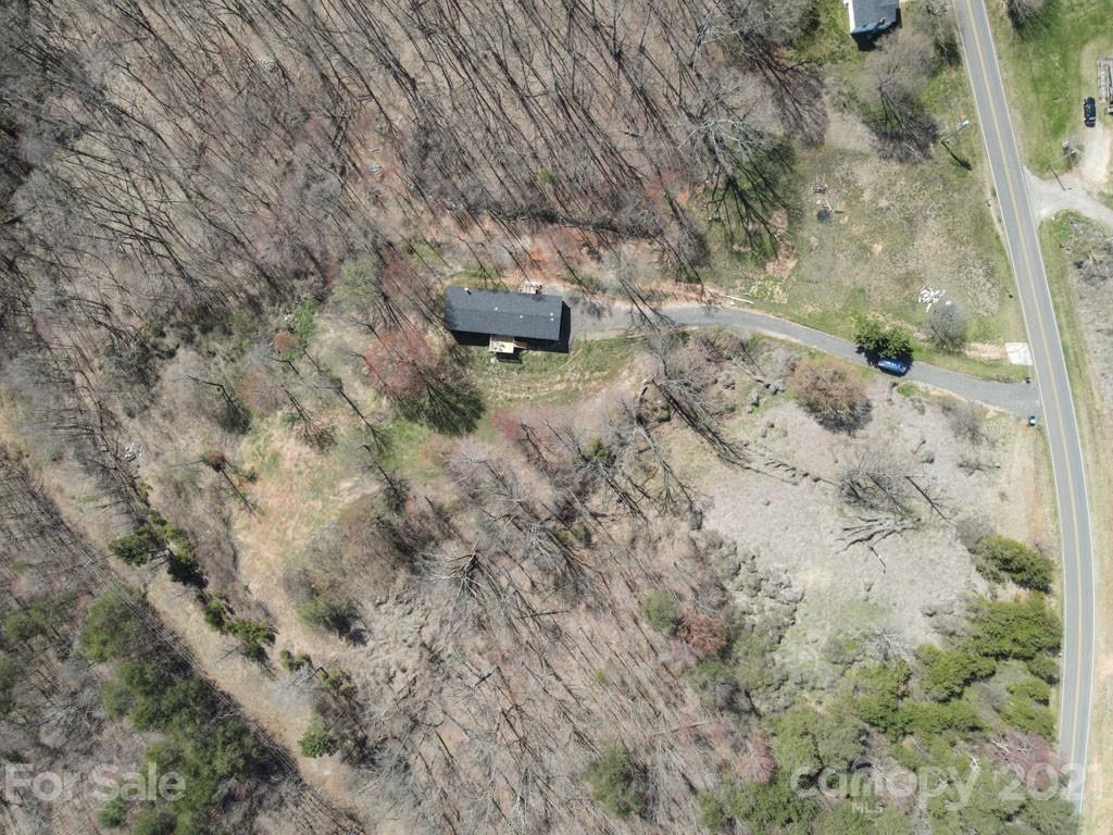 5375 Hope Road Vale, NC 28168 - Photo 2 of 10 a view of a dry yard with trees