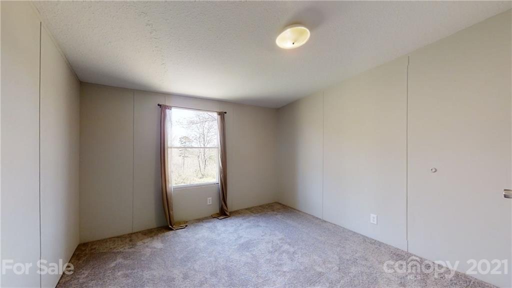 5375 Hope Road Vale, NC 28168 - Photo 5 of 10 a view of an empty room with window
