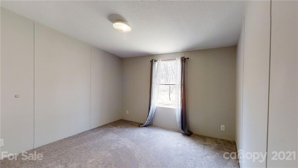 5375 Hope Road Vale, NC 28168 - Photo 6 of 10 an empty room with windows
