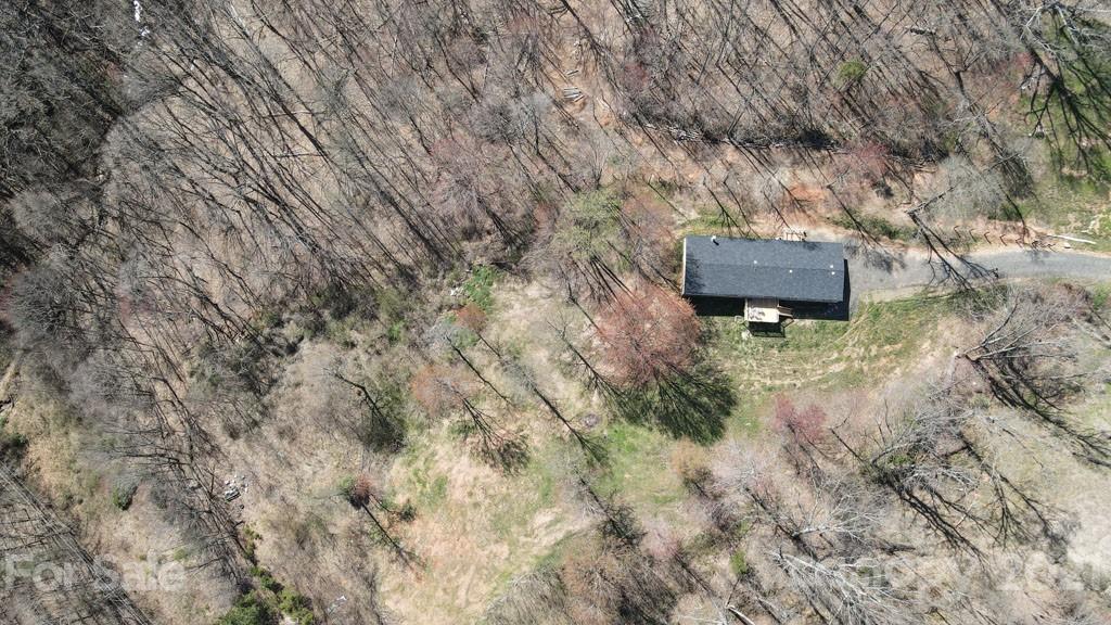 5375 Hope Road Vale, NC 28168 - Photo 10 of 10 a backyard of a house with a yard and garage