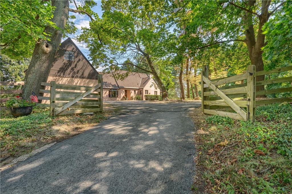 200 Stone Quarry Road Monaca, PA 15061 - Photo 1 of 45 a backyard of a house with lots of green space