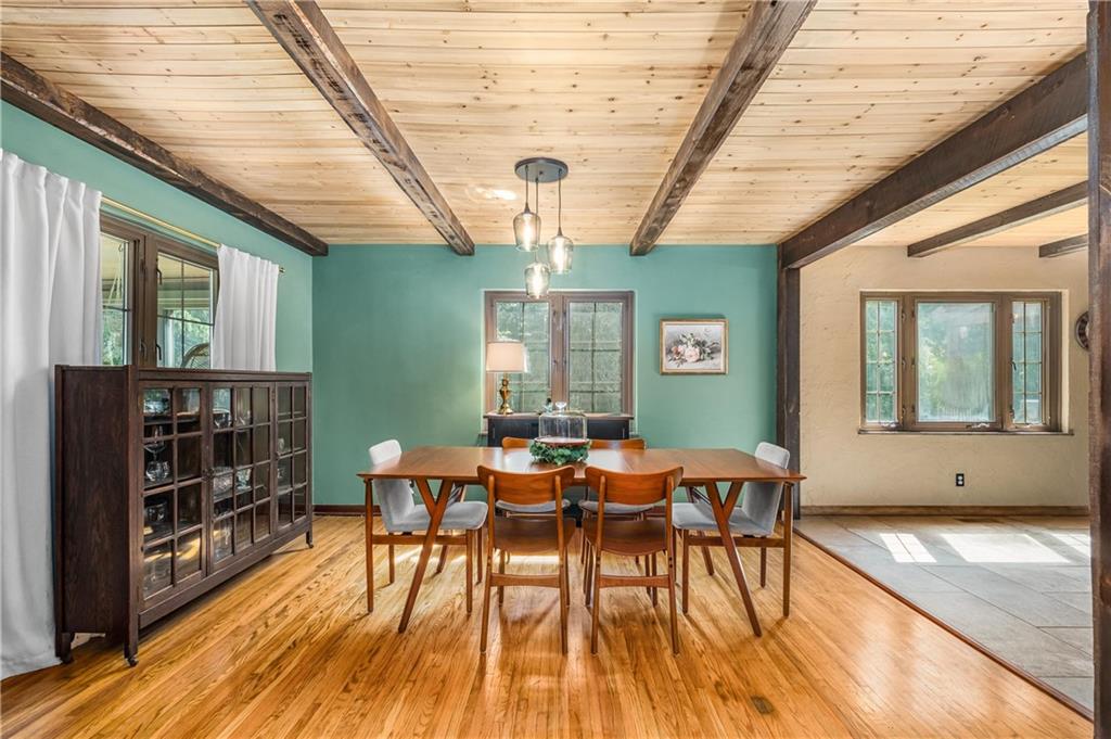 200 Stone Quarry Road Monaca, PA 15061 - Photo 14 of 45 a view of a dining room with furniture window and wooden floor