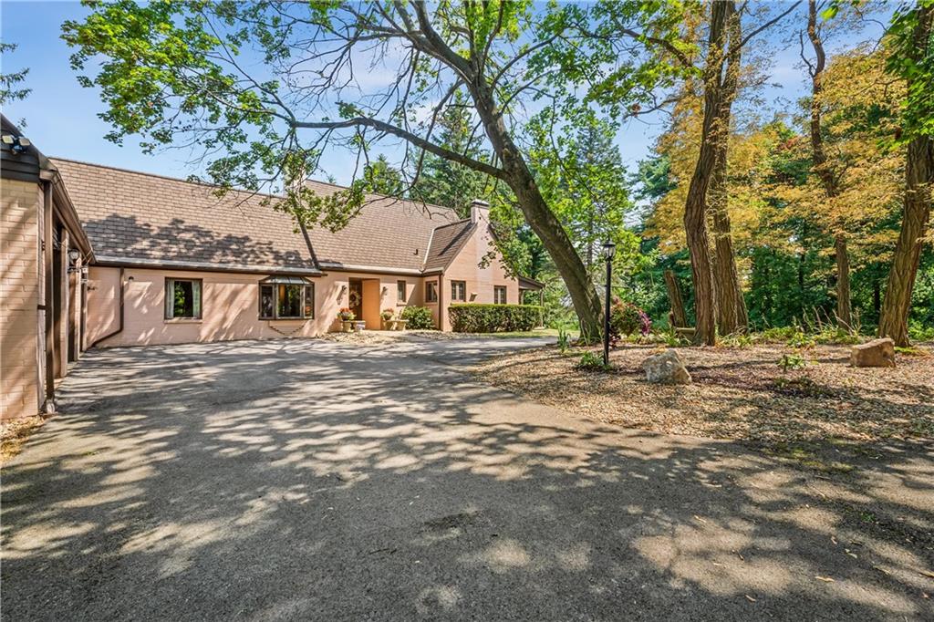 200 Stone Quarry Road Monaca, PA 15061 - Photo 2 of 45 a front view of a house with a tree