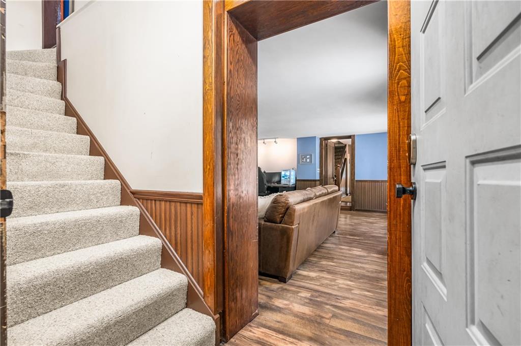 200 Stone Quarry Road Monaca, PA 15061 - Photo 31 of 45 a view of a living room with furniture and a fireplace