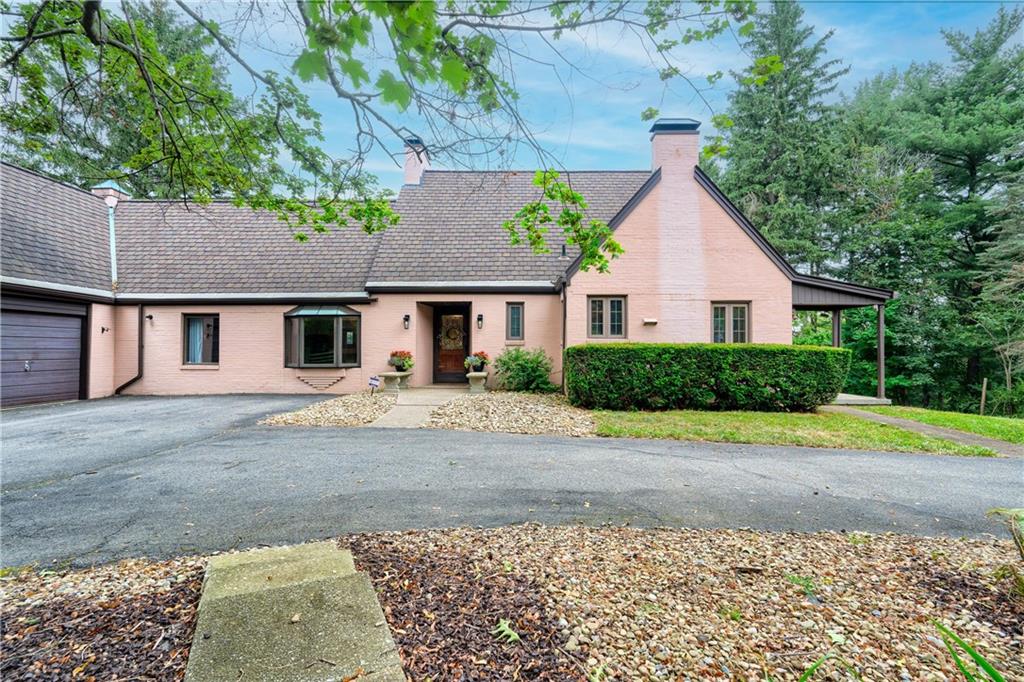 200 Stone Quarry Road Monaca, PA 15061 - Photo 34 of 45 a front view of a house with a yard and a garage