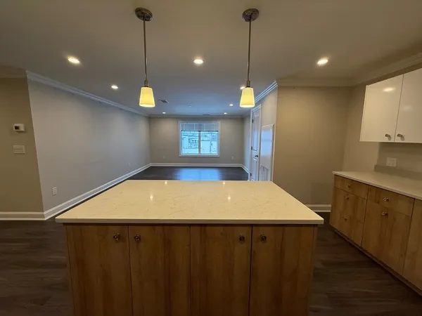 a view of a kitchen with a sink and dishwasher