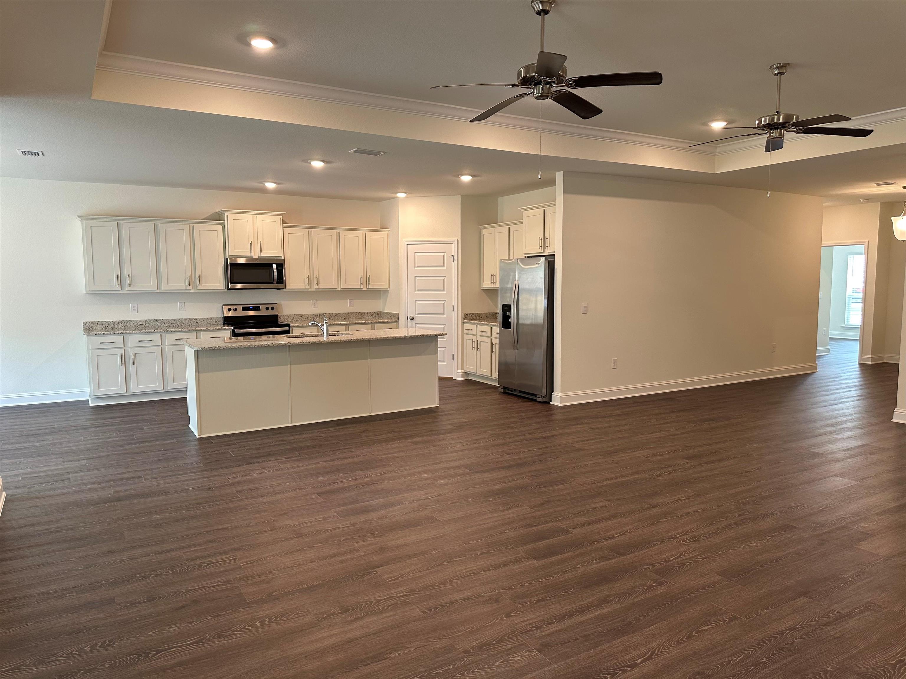 1808 Carly Street, Unit 13 Foley, AL 36535 - Photo 8 of 33 Living room to kitchen