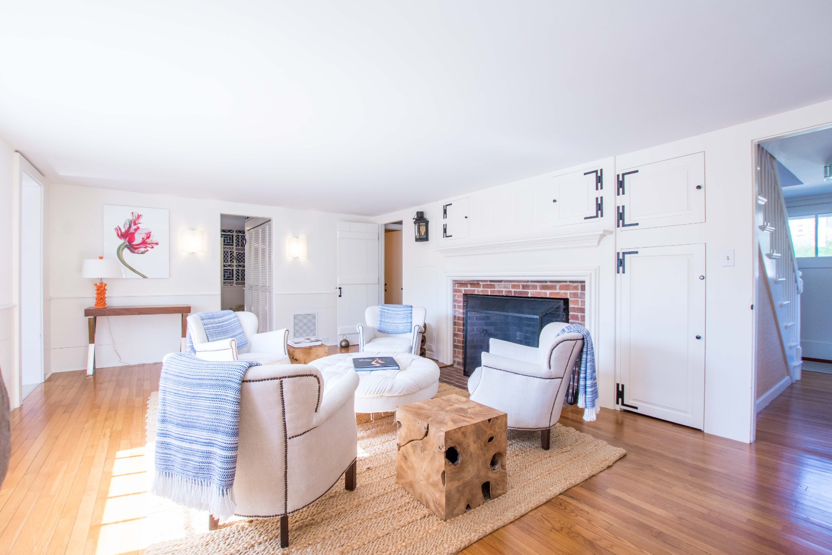 60 Cliff Road Nantucket, MA 02554 - Photo 20 of 54 a living room with furniture and a fireplace