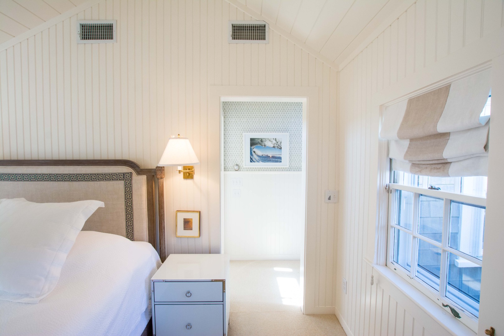 60 Cliff Road Nantucket, MA 02554 - Photo 30 of 54 a bedroom with a bed and a cabinets