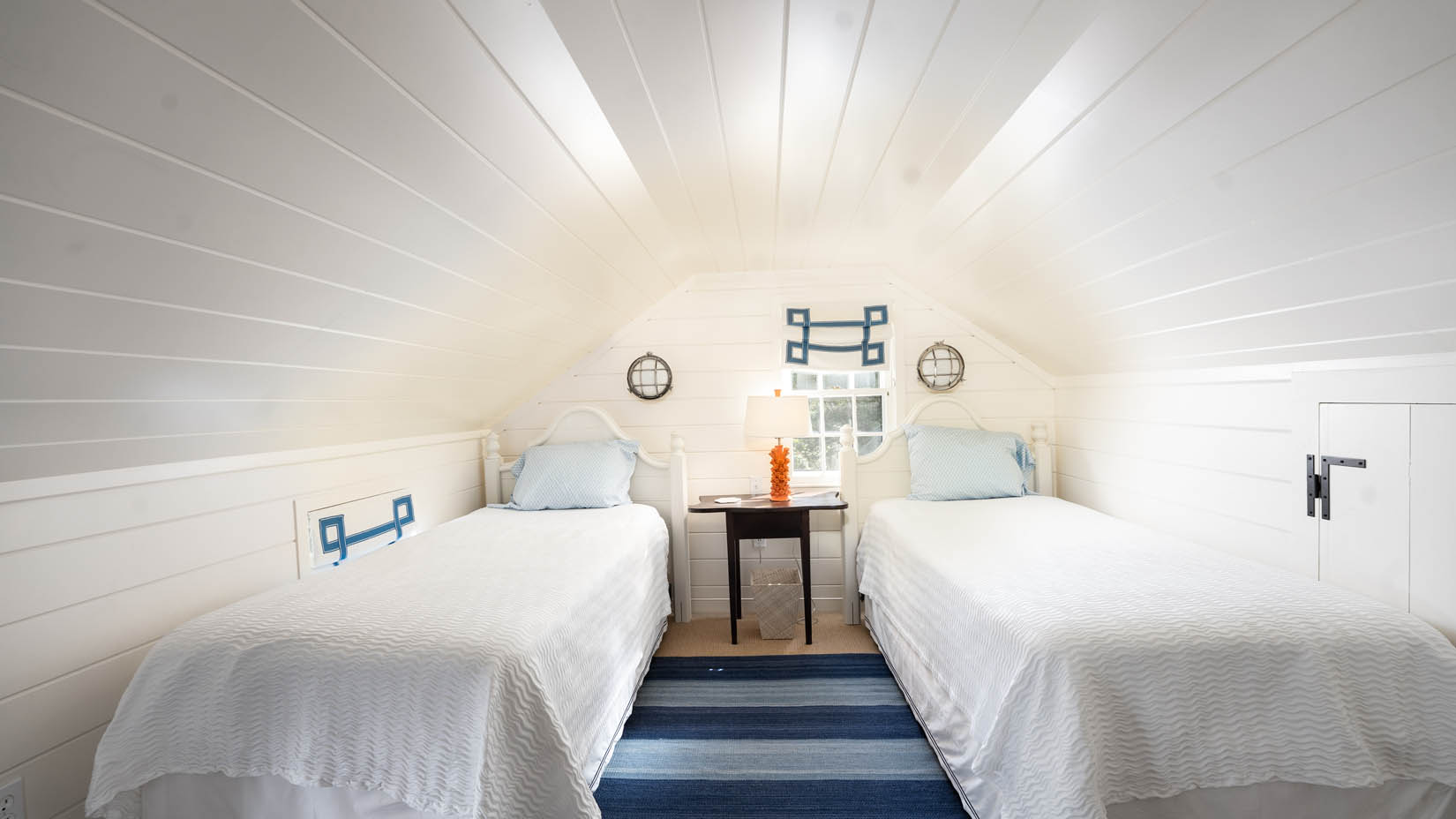 60 Cliff Road Nantucket, MA 02554 - Photo 42 of 54 a bedroom with double bed and a window