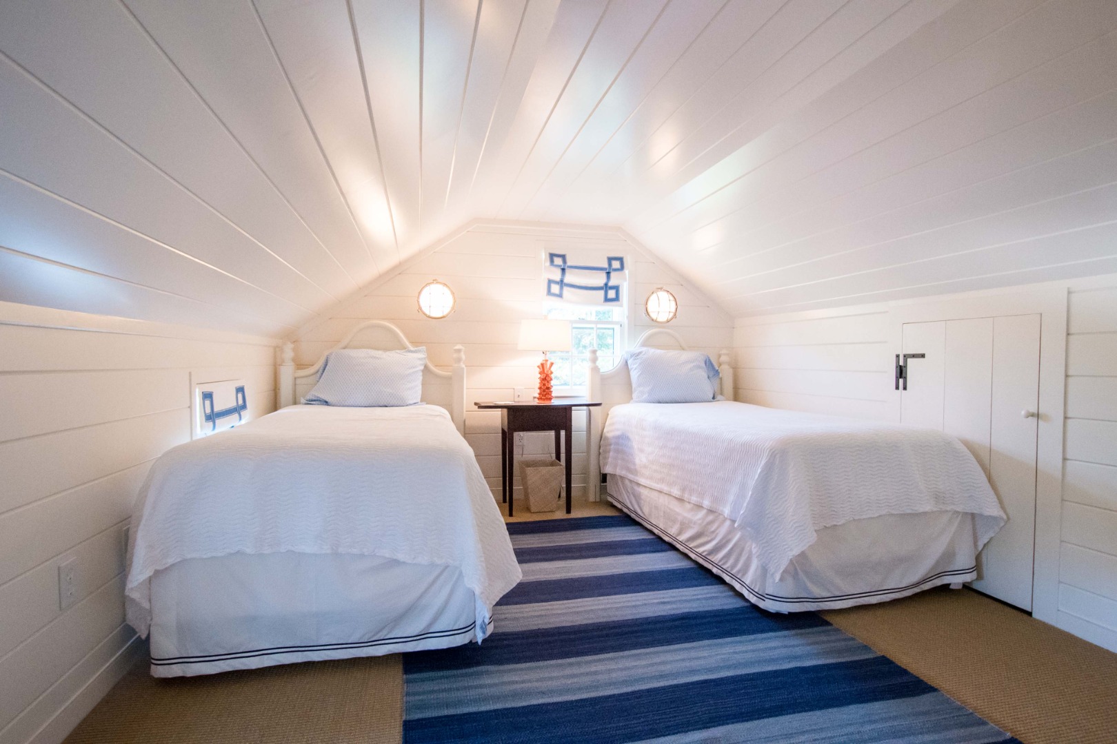 60 Cliff Road Nantucket, MA 02554 - Photo 43 of 54 a bedroom with a bed and wooden floor