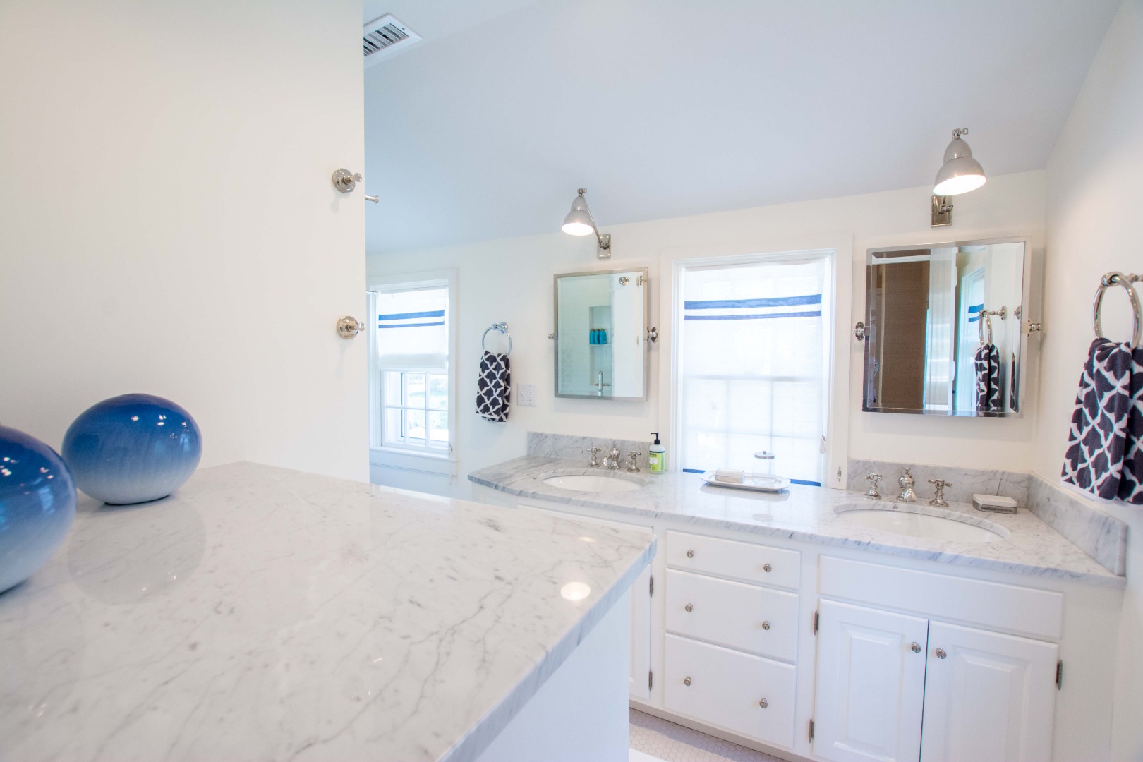 60 Cliff Road Nantucket, MA 02554 - Photo 45 of 54 a bathroom with a granite countertop sink and a mirror
