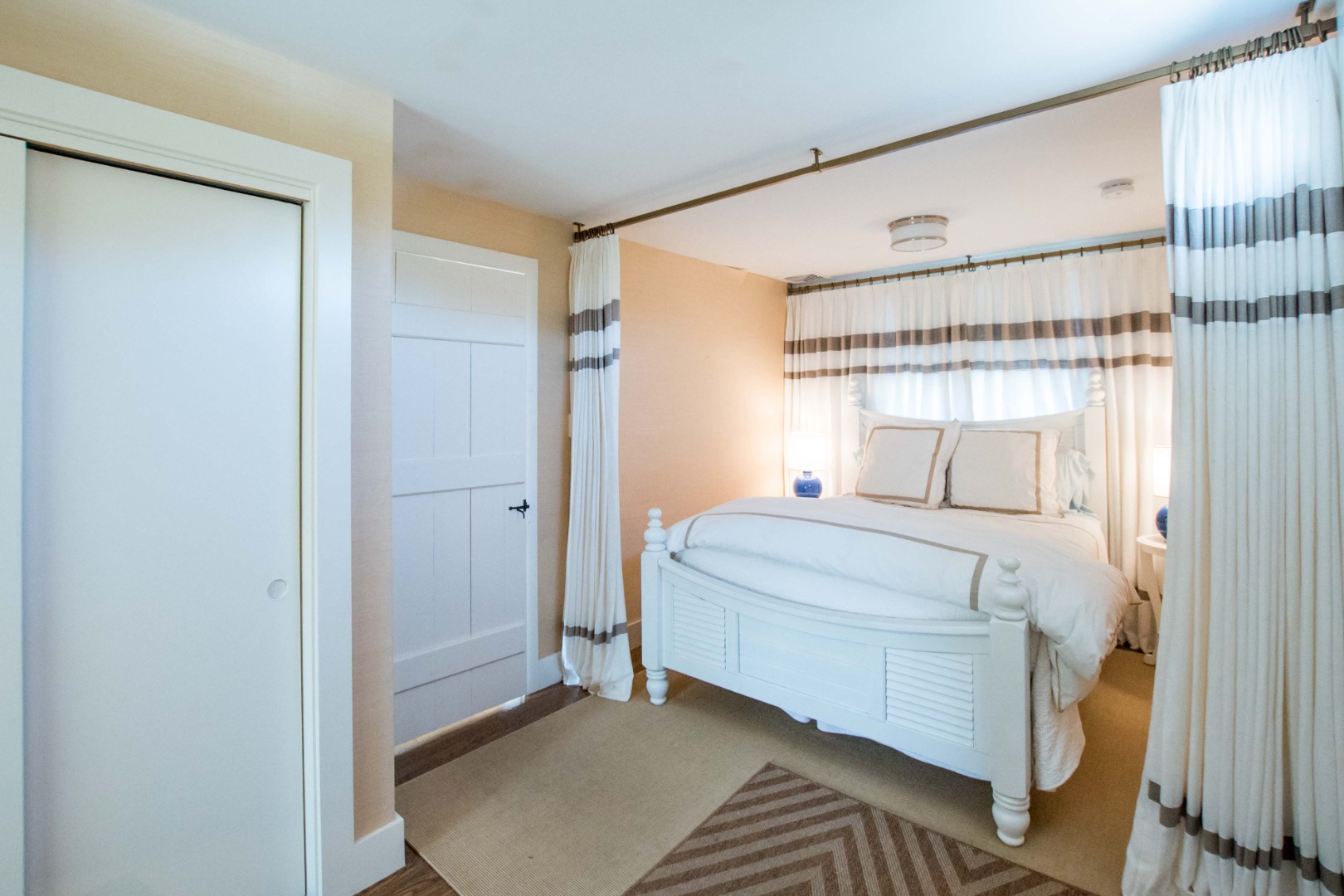 60 Cliff Road Nantucket, MA 02554 - Photo 50 of 54 a bedroom with a bed and a window