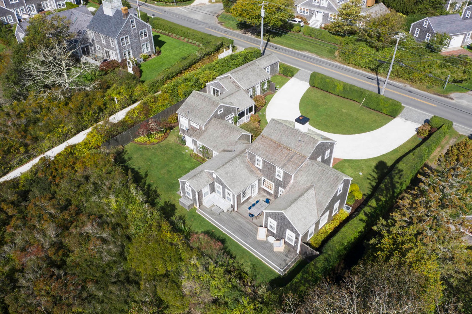 60 Cliff Road Nantucket, MA 02554 - Photo 5 of 54 an aerial view of a house a yard and a swimming pool