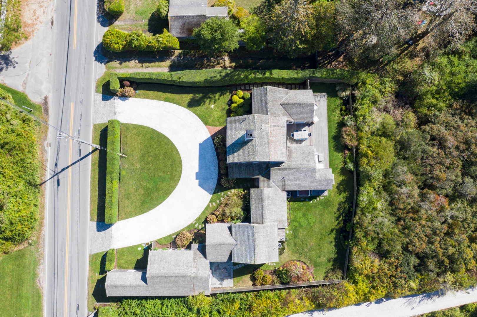 60 Cliff Road Nantucket, MA 02554 - Photo 53 of 54 an aerial view of a house with a swimming pool