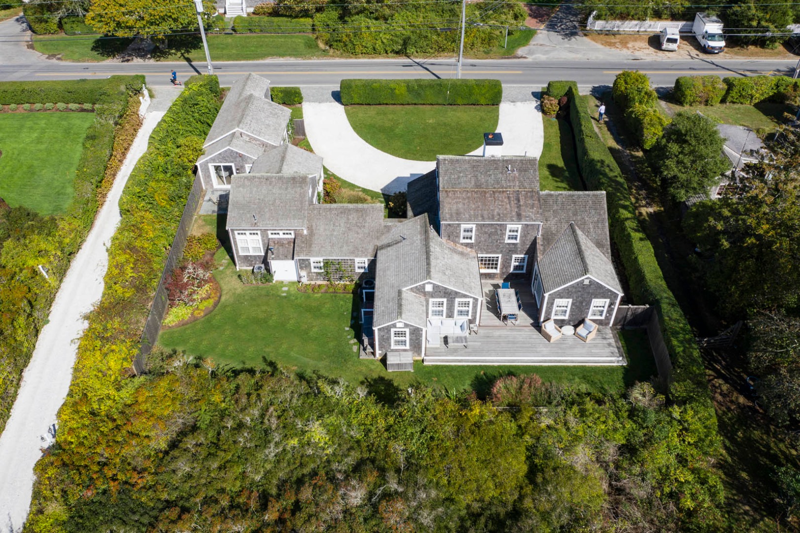 60 Cliff Road Nantucket, MA 02554 - Photo 54 of 54 an aerial view of a house with a garden and swimming pool