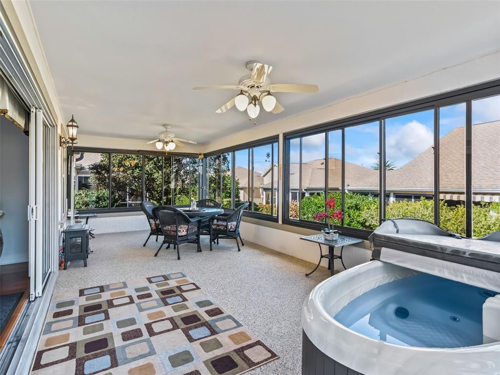 1085 Ridgeland Path The Villages, FL 32162 - Photo 23 of 56 a living room with furniture and a large window