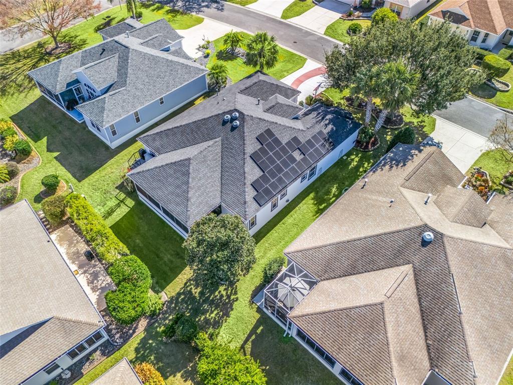 1085 Ridgeland Path The Villages, FL 32162 - Photo 46 of 56 an aerial view of a house with a yard