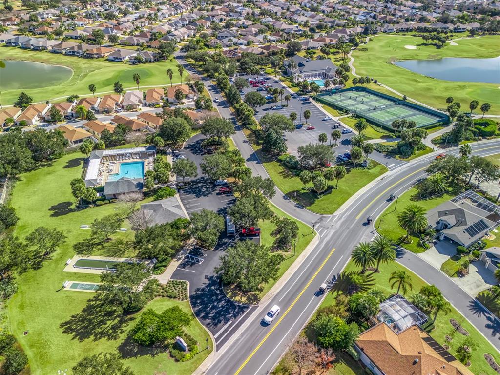 1085 Ridgeland Path The Villages, FL 32162 - Photo 52 of 56 an aerial view of lake residential houses with outdoor space and swimming pool