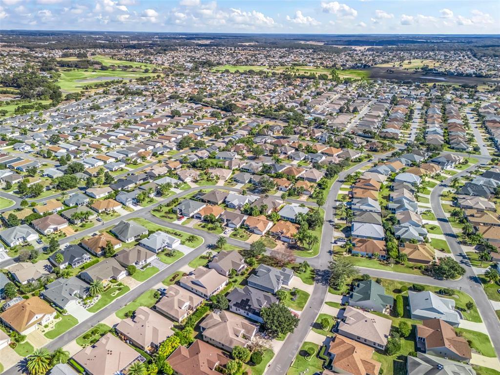 1085 Ridgeland Path The Villages, FL 32162 - Photo 55 of 56 an aerial view of a residential houses with city view